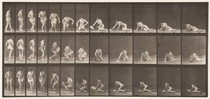 Lying on Ground and Reading by Eadweard Muybridge