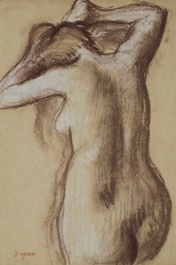 Young Naked Woman Combing Her Hair