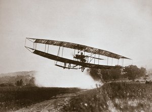 American aviator Glenn Curtiss making the first heavier-than-air flight in his 