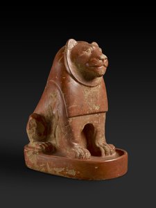 Statuette of a Lion seated on a plinth, from the temple precinct at Hierakonpolis, Egyptian, late Protodynastic, end of the Old Kingdom, c.2700-2200 BC by Egyptian
