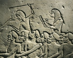 Negroid prisoners surrounded by guards armed with clubs while a scribe draws up a report (detail) by Egyptian 18th Dynasty