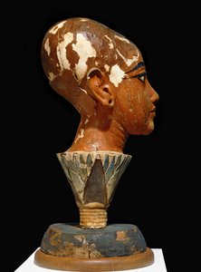 Painted bust of young Pharaoh Tutankhamun with lotus leaf shaped base by Egyptian 18th Dynasty