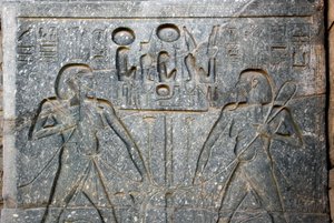 Egyptian Antiquity: Detail of the Base of the Statue of Pharaoh Ramses II Representing the Union of Upper and Lower Egypt. Temple of Luxor, East Bank (Thebes), Egypt