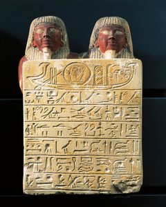 Limestone stele of Dydy and his son Pendua, master carpenters, offering hymn to the sun god Ra, from Deir el-Medina by Egyptian 19th Dynasty