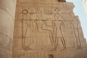 Relief depicting the lioness-headed goddess Mut presenting Ramesses II to an enthroned Amun, who gives him an ankh, from the Great Hypostyle Hall