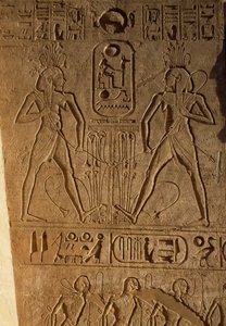 Union between Upper and Lower Egypt and cartouche of Pharaoh, relief on base of thrones, Temple of Ramesses II, Abu Simbel, Egypt, New Kingdom, Dynasty XIX