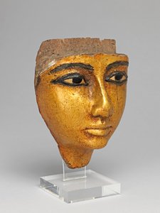 Face from a coffin, with eyes and eyebrows inlaid, gilded