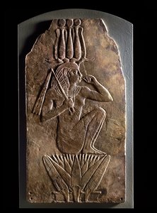 Plaque of Iuput II as child-god emerging from lotus flower by Egyptian 23rd Dynasty