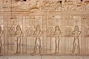 Egyptian antiquity: offerings and tributes presented to the goddess, Temple of Hathor, Denderah, Egypt by Egyptian Ptolemaic Period