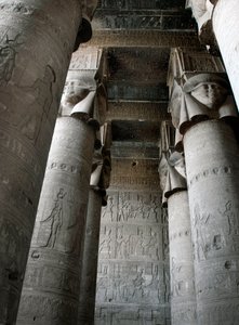Partial view of the hypostyle room with columns decorated with the representation of the goddess Hathor. Temple of Hathor, Denderah, Egypt