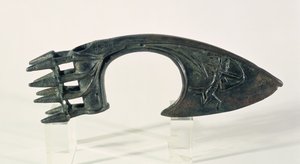 Axe blade depicting an archer, possibly from Lorestan, Iran, late 2nd or early 1st millennium BC by Elamite