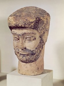 Head of a beaded man by Elamite
