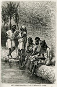 Negres and negresses of the Sahara, on the banks of the Oued Rihr. Engraving by E.Bayard, to illustrate the Algerian Sahara, by V.Largeau, in 1874-1878, published in the Tour du monde, under the direction of Edouard Charton by Emile Antoine Bayard