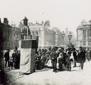 A Crowd Gather to Watch a Puppet Show in London by English Photographer