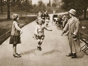 A girl skipping in Hyde Park or Kensington Gardens, from Wonderful London, published 1926-27 by English Photographer