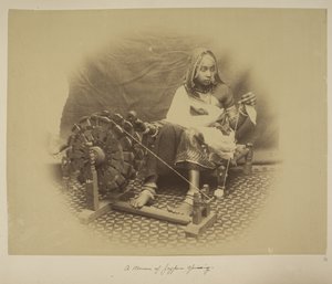 A woman of Jeypore spinning, c.1890 by English Photographer