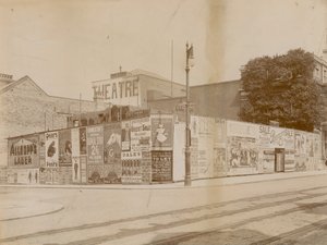 Advertisements on corner of Latchmere Road and Lavender Hill, Wandsworth, London by English Photographer