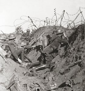 Awaiting the great Hun attack, observation officer and signallers at St Quentin keep a sharp look out by English Photographer