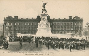 Buckingham Palace and Queen Victoria Memorial; The Guards Band passing by English Photographer