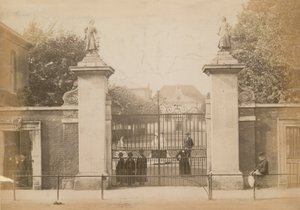 Children Standing Looking Through the School Gate by English Photographer