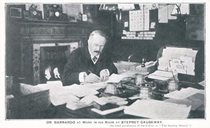 Dr Barnardo at work in his room at Stepney Causeway by English Photographer