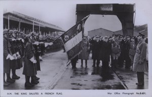 HM The King Salutes a French Flag