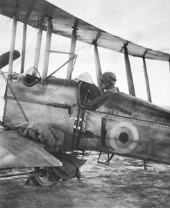 How Kut Garrison was fed by flying-machine: ready for flight with bags of grain