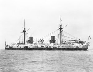 View of the ironclad battleship HMS Inflexible (launched 1876) pictured after conversion to military rig in 1885