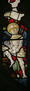 A detail from the east window depicting a member of the angelic Hierarchy, a Power