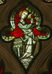 A window in the Lady Chapel depicting a musician angel with bells by English School