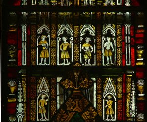 A window in the Lady Chapel depicting canopy figures by English School