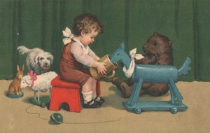 A young boy sits playing with his toys in a nursery by English School