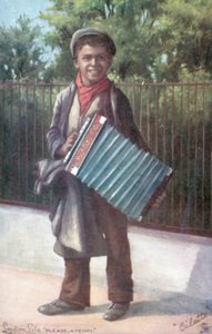 Boy playing an accordion