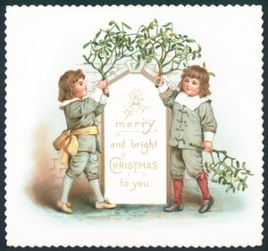 Boys hanging mistletoe to sign by English School