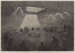 Coiling the Atlantic Telegraph Cable in One of the Tanks on Board the Great Eastern by English School