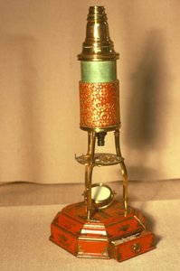Culpeper-style microscope, with chinoiserie style base and gold-tooled body