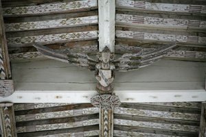 View of one of the carved wooden angels in the nave