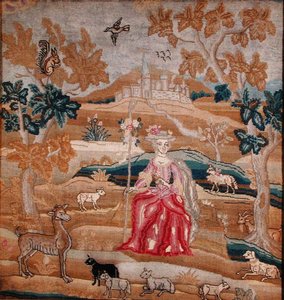 Embroidered panel depicting a shepherdess in front of a village by English School