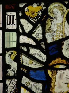 Fragments including a young saint with a bird by English School