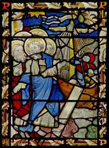 The east window depicting St Peter embarks on a boat with other Apostles by English School