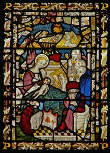 The east window depicting the Adoration of the Shepherds by English School