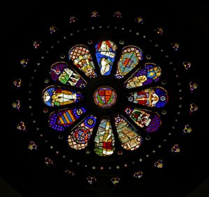The west rose window with various reset panels (rose window - internal) by English School