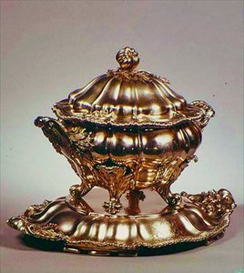 Tureen, melon-shaped, with pomegranate finial, applied gadrooned border and foliate handles, by Garrards, London, 1847 by English School