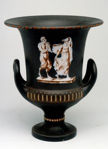 Wedgwood vase depicting a young girl and a black ceramic satyr painted 
