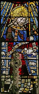 Window depicting Christ (composite figure) - with jewels of inset coloured glass by English School