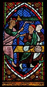 Window depicting Jesus overthrows the Temple merchants by English School