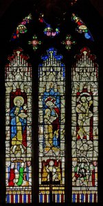 Window Ew depicting St John the Baptist, St Anne and the Virgin Mary with St Christopher