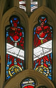 Window depicting angels on wheels with antiphons by English School