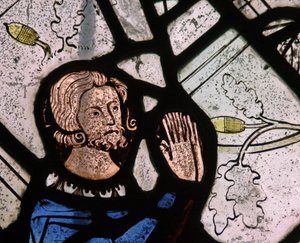 Window depicting a donor by English School