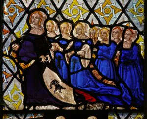 Window depicting Isobel Saunders, wife of Walter Curson and their seven daughters